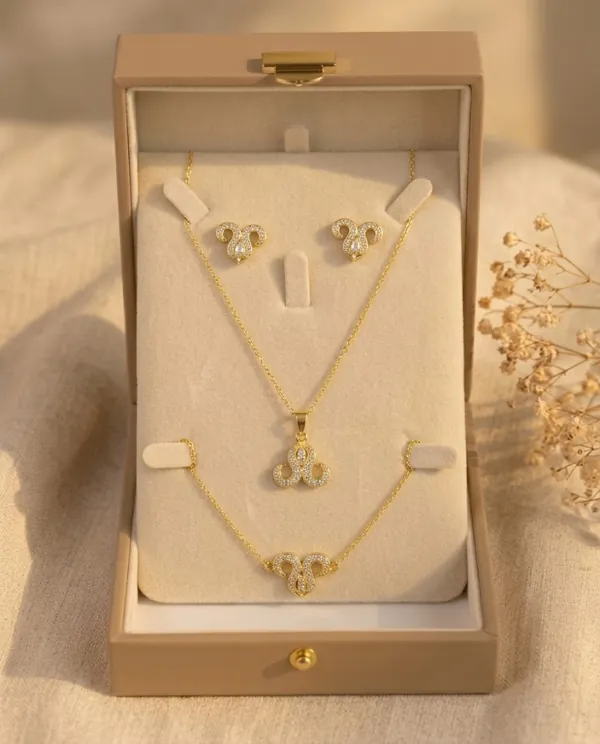 Parure Arabesque Pavée — Collier, Bracelet & Puces