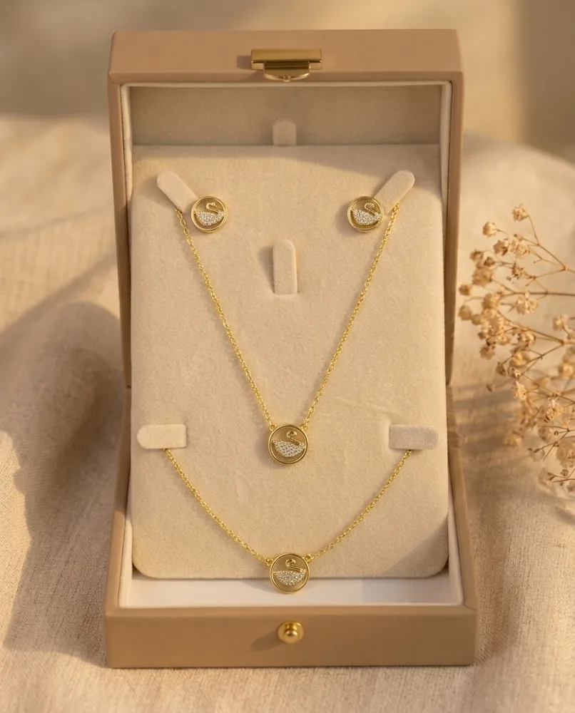 Parure Cygne Doré — Collier, Bracelet & Puces